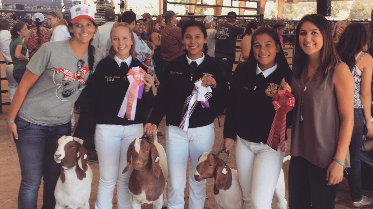 Coast Union High School FFA leader (left) Darcy Wetzel poses with students and their goats: Alyssa Drew, Alondra Mercado, Angelique Gutierrez and agriculture teacher Yvonne Staffler.
