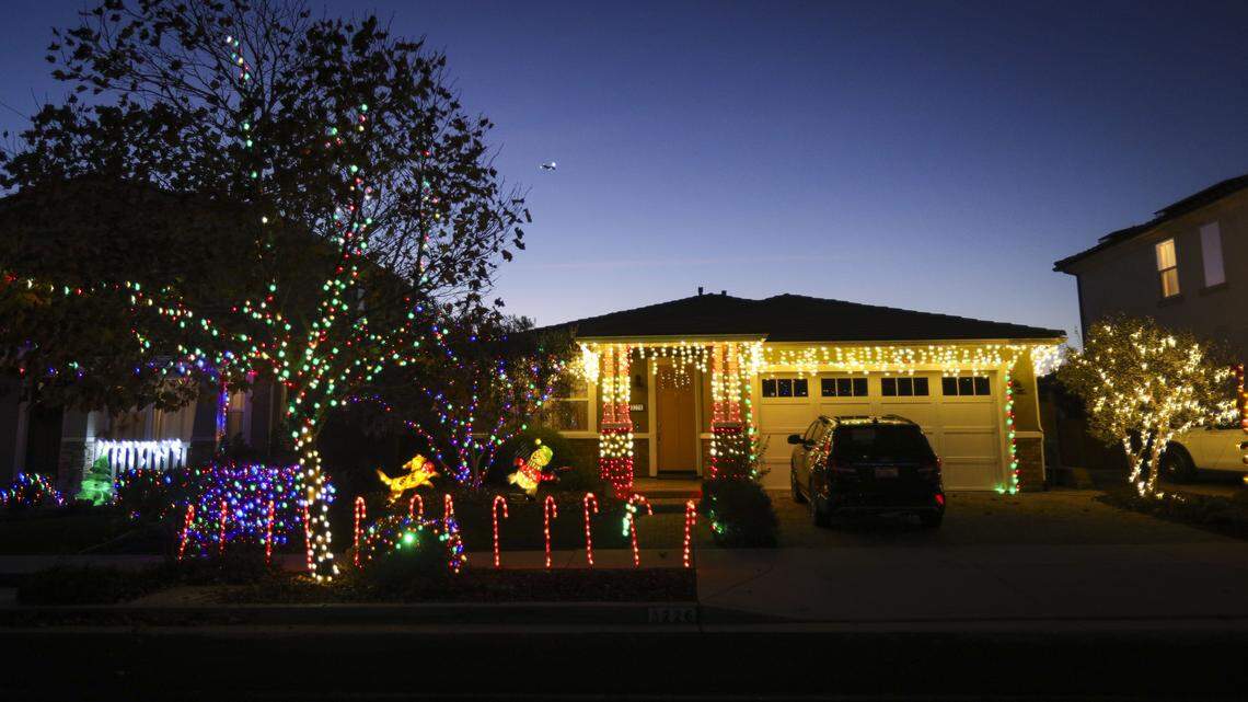 Daisy Lane in San Luis Obispo has candy canes and a frisbee throwing snowman& dog. Holiday season is lighting up the night on Dec. 1, 2025.