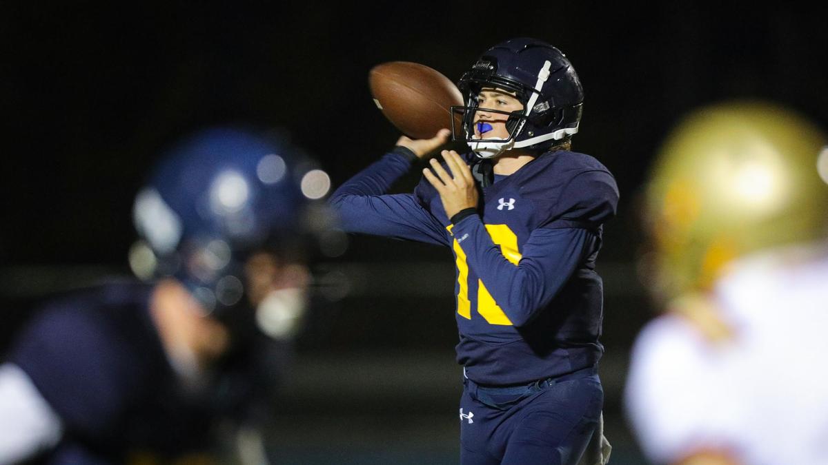 Quarterback Drake Missamore throws for Arroyo Grande in the Eagles’ 39-7 loss to Centennial of Bakersfield on Aug. 26, 2022.