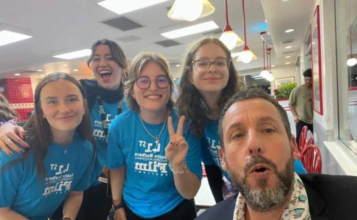 Fans and Santa Barbara International Film Festival volunteers find Adam Sandler at In-N-Out shortly after he accepted the Maltin Modern Master Award on Thursday night.