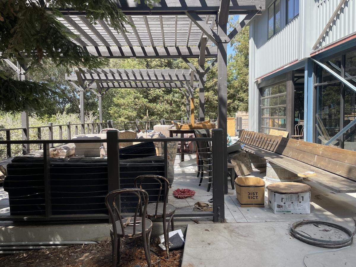 The city says a condemned property at 1150 Laurel Lane in San Luis Obispo has not been repaired and numerous safety concerns were present. Debris and abandoned furniture sits outside of the space that formerly housed Bang the Drum Brewery on Sept. 11, 2025.