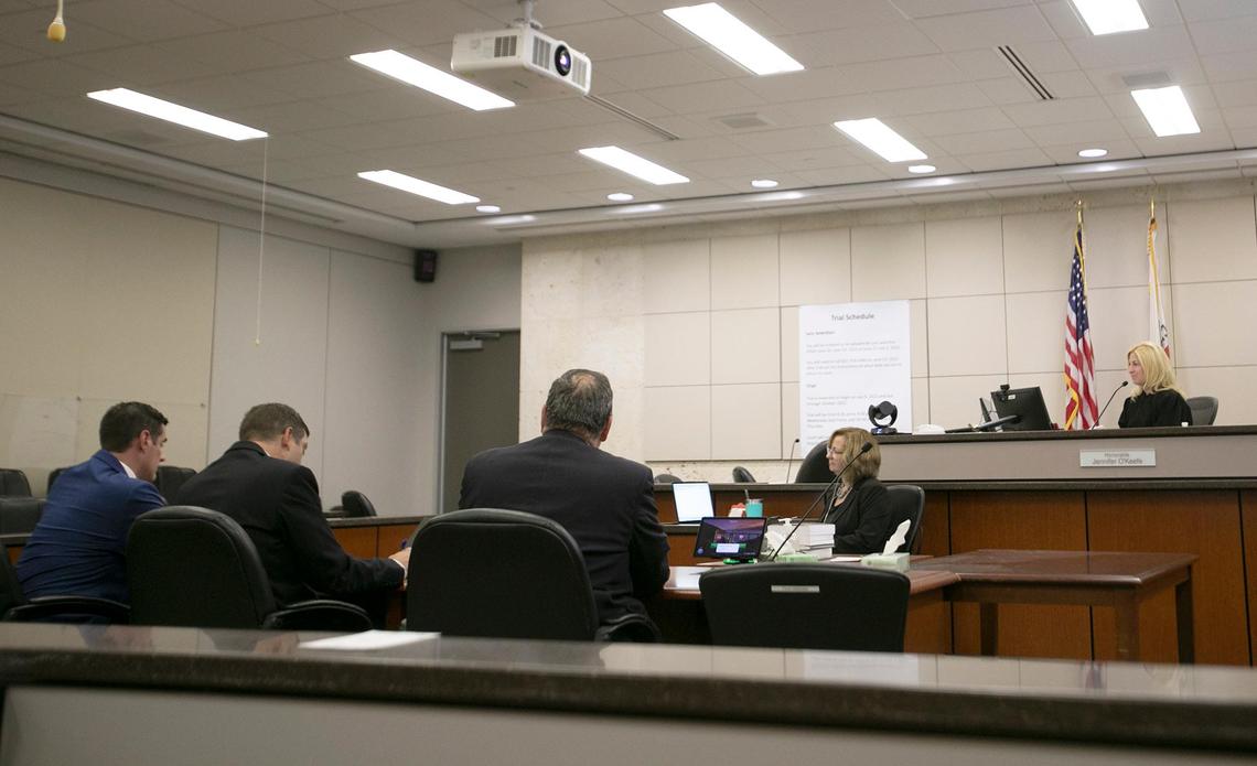 Judge Jennifer J. O’Keefe excuses a juror from Ruben Flores’ panel on Thursday, Oct. 13, 2022, at Monterey County Superior Court in Salinas. O’Keefe excused the juror after learning he had talked about the case to his priest. San Luis Obispo County prosecuting attorney Chris Peurvrelle, left, San Luis Obispo County D.A.’s Investigator J.T. Kamp and Ruben Flores’ attorney Harold Mesick sit before the judge.