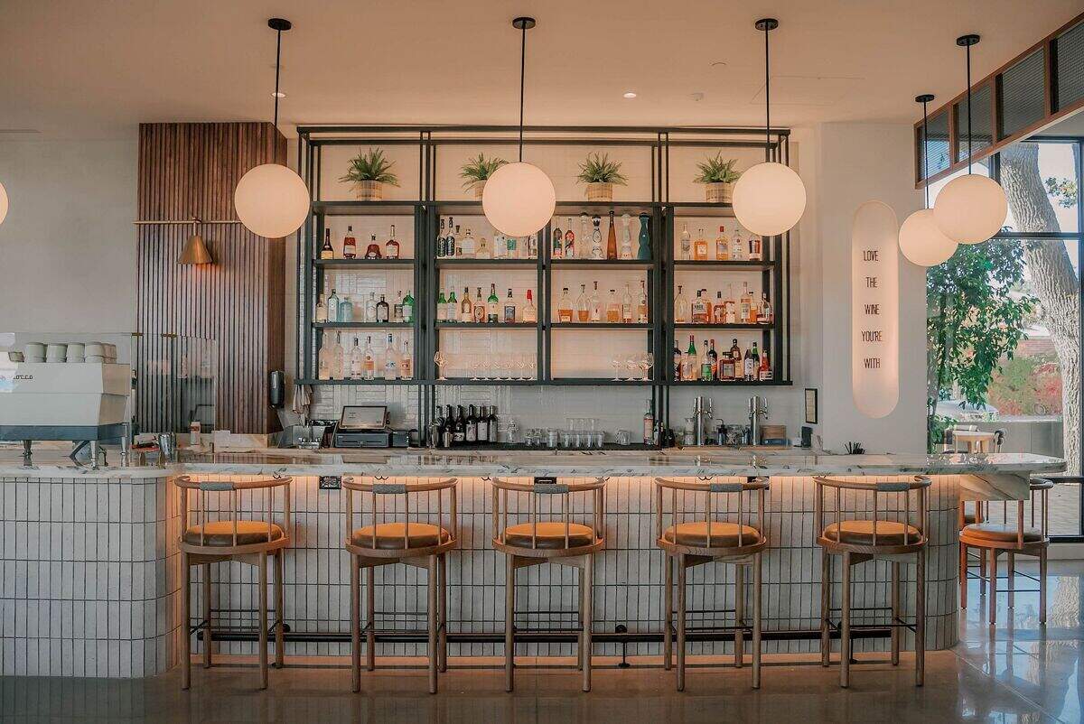 Pine Street Bistro transitions easily from morning coffee service to evening cocktails, reflecting the restaurant’s role as Ava Hotel’s all-day neighborhood bistro.