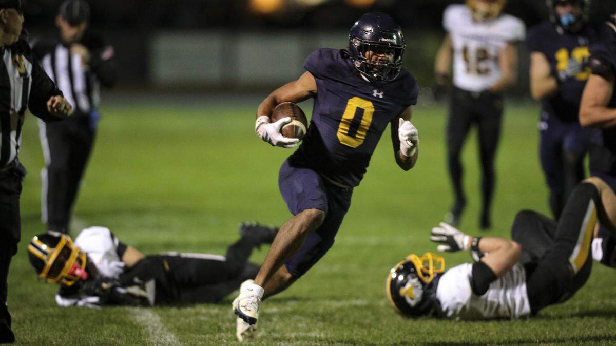 Caleb Clark on his way to the second Arroyo Grande touchdown. He followed it with a two point conversion run. Ventura beat Arroyo Grande 35-28 in a high school state football championship semi-final on Dec. 5, 2025.