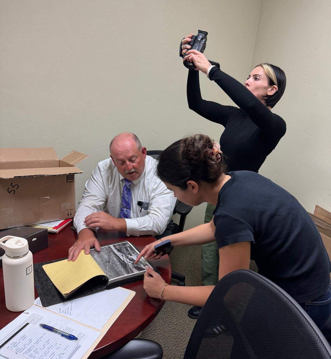 San Luis Obispo County Sheriff’s Office Detective Clint Cole shows “Crime Junkie” podcast hosts crime scenes of the 1980 cold case double murder of 4-year-old Martha Mezo and 5-year-old Teresa Flores. A Nov. 10, 2025, episode of the podcast reports on the reopened investigation, led by Cole.