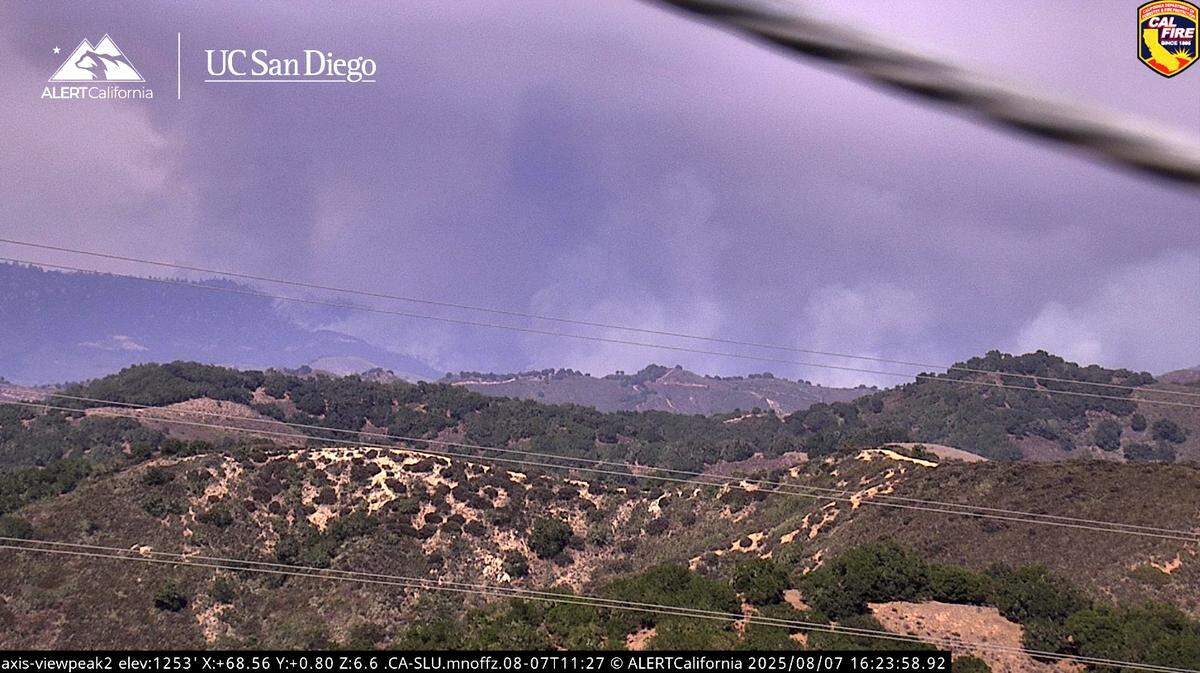 The Gifford Fire burns in the hills east of Arroyo Grande on Thursday, Aug. 7, 2025, as seen from the View Peak 2 camera on the ALERTCalifornia network.