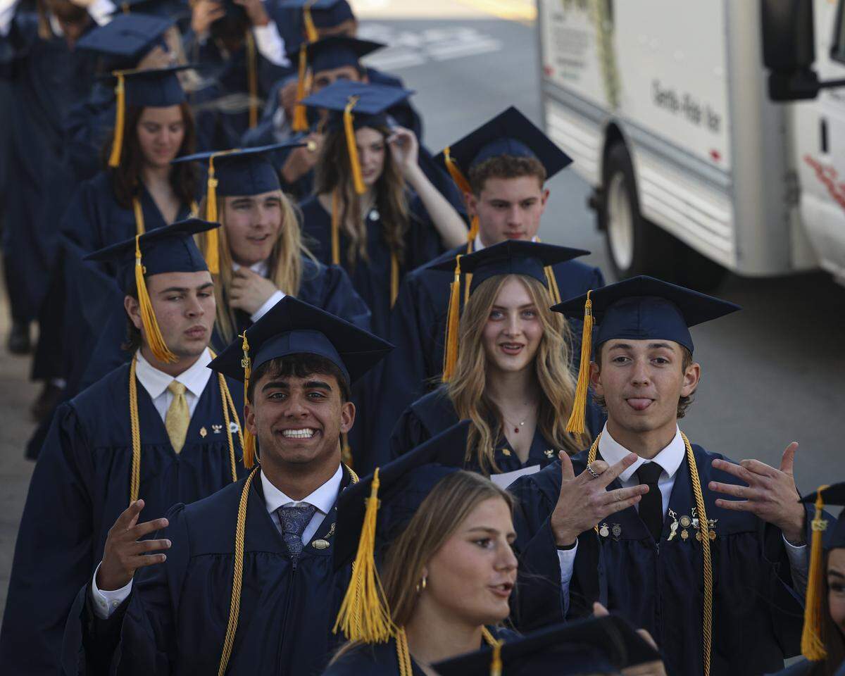 Students walk to ceremony in Mission Plaza. Mission Prep graduated 66 students in a ceremony at Old Mission San Luis Obispo on May 29, 2026.