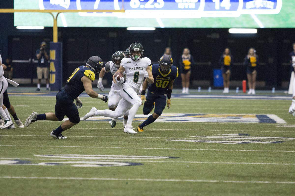 Cal Poly’s J.J. Koski carries the ball during the Mustangs’ win over Northern Arizona in a Big Sky Conference football game on October 27, 2018, at the J. Lawrence Walkup Skydome in Flagstaff, Arizona. Koski now plays for the L.A. Rams.