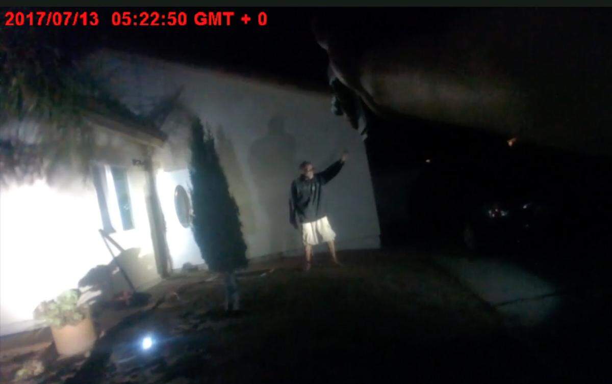 Kenneth Alan Eustace yells at police officers while swinging a metal pipe attached to a rope, moments before he was fatally shot on July 12, 2017.