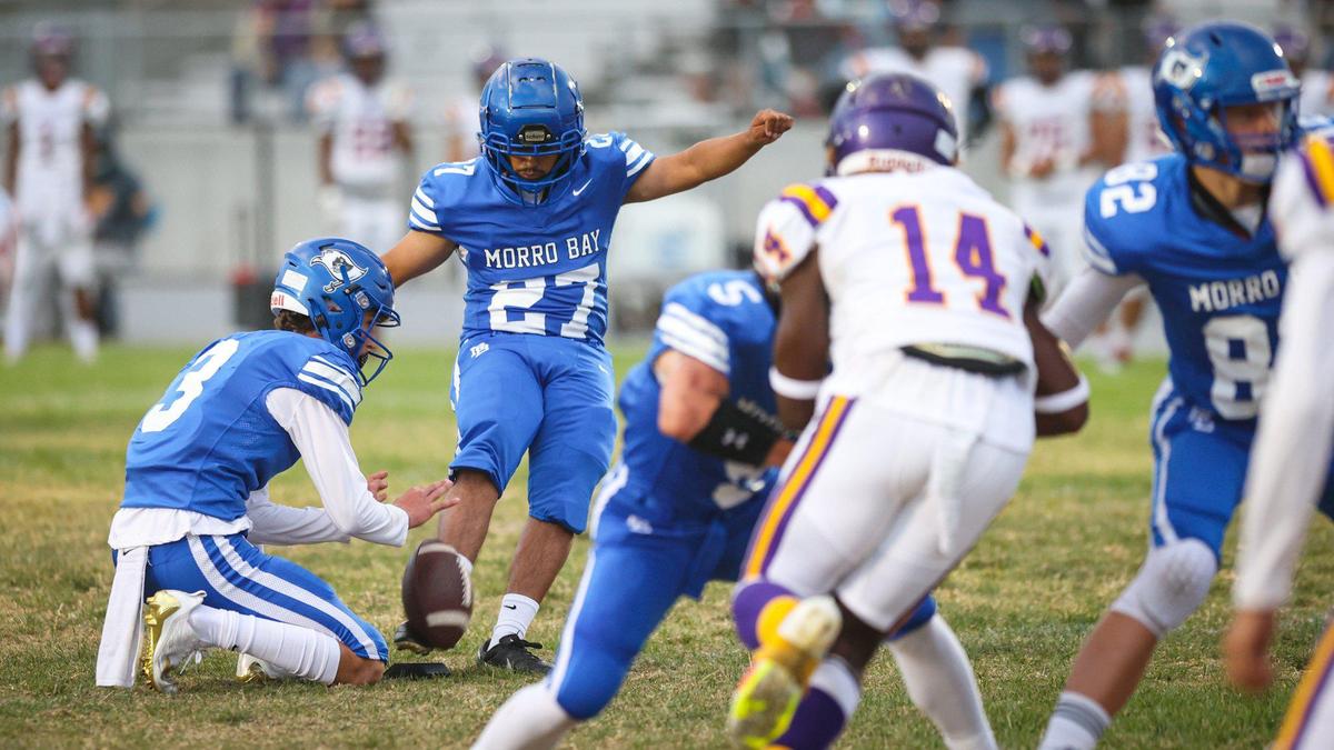 A.J. Alvarez kicks an extra point for Morro Bay in a game the Pirates led 28-13 over Fresno before it was canceled due to lightning on Sept. 9, 2022.