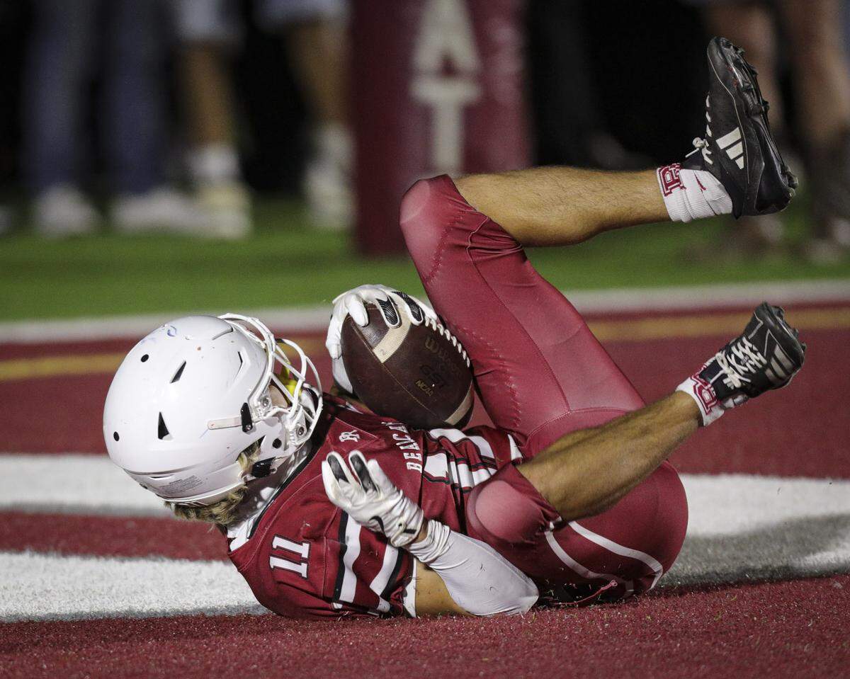 Emmett Dobroth makes a touchdown catch. Arroyo Grande beat Paso Robles 56-14 on Oct. 3, 2025.