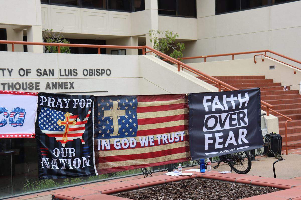 Over a hundred people gathered on the steps of the San Luis Obispo Superior Courthouse to celebrate the National Day of Prayer on Thursday, May 1, 2025, an event led by District Attorney Dan Dow.