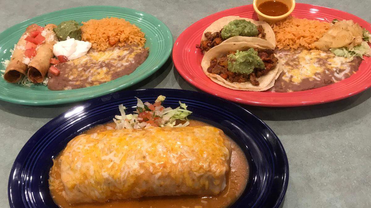 A massive Burrito Ranchero, complete with a chile relleno, carne asada, rice, beans and more inside, is one of the most popular entrees at the new La Katrina Cocina at 500 Embarcadero in Morro Bay. In the background are the eatery’s Alambre soft tacos (at right, with steak, chorizo, bacon and pineapple) and flautas (they also have a four-tacquito appetizer).