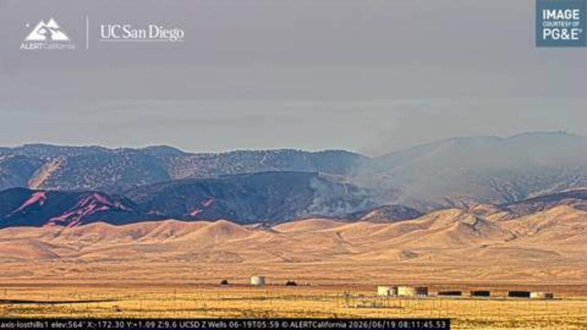The 7,500-acre Lost Fire burns vegetation on June 19, 2026, in Kern County, forcing evacuation zones bordering the San Luis Obispo County line.