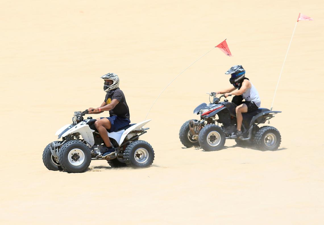 Riders in the OHV area of Oceano Dunes SVRA, Saturday, June 29, 2019.