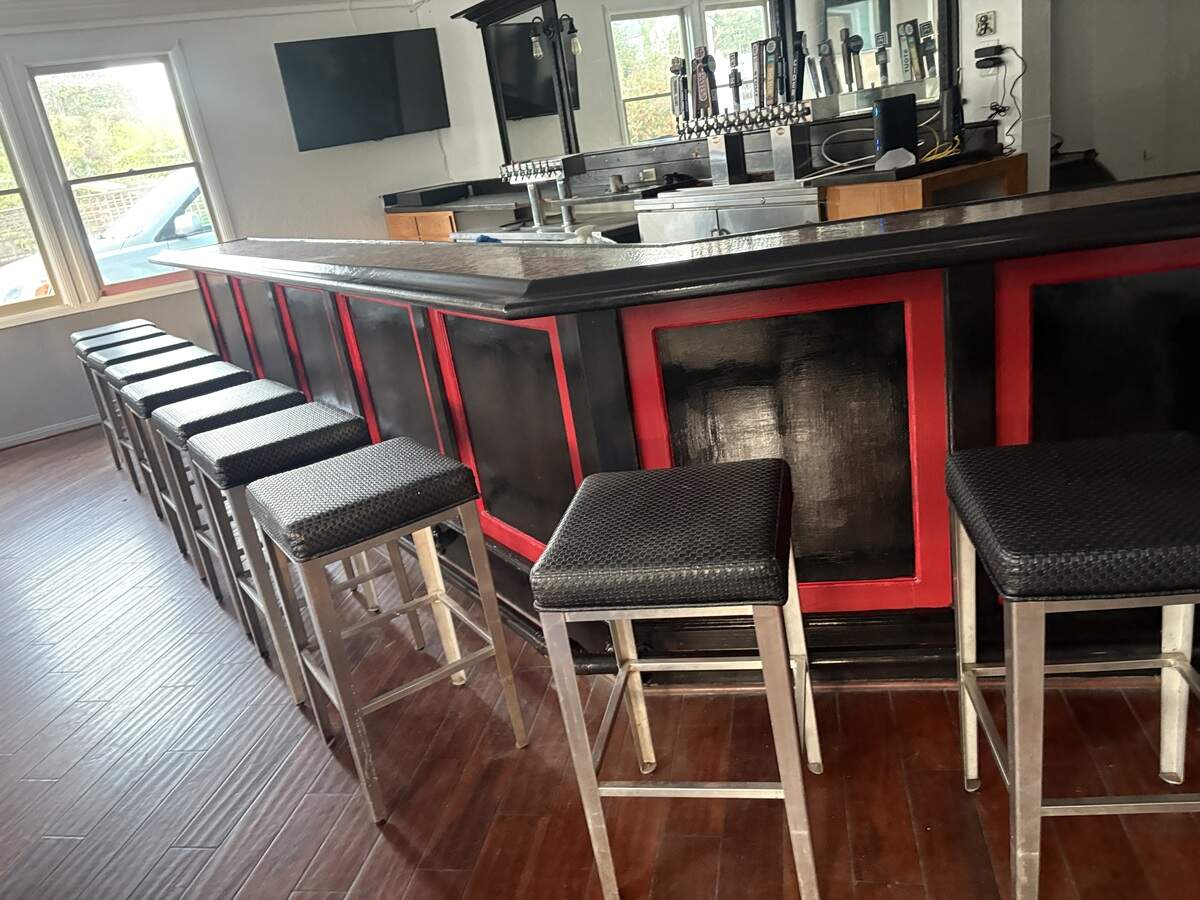 The revamped bar at Cambria New Diner adds to the retro red-and-black decor. The restaurant was slated to open in July 2026.