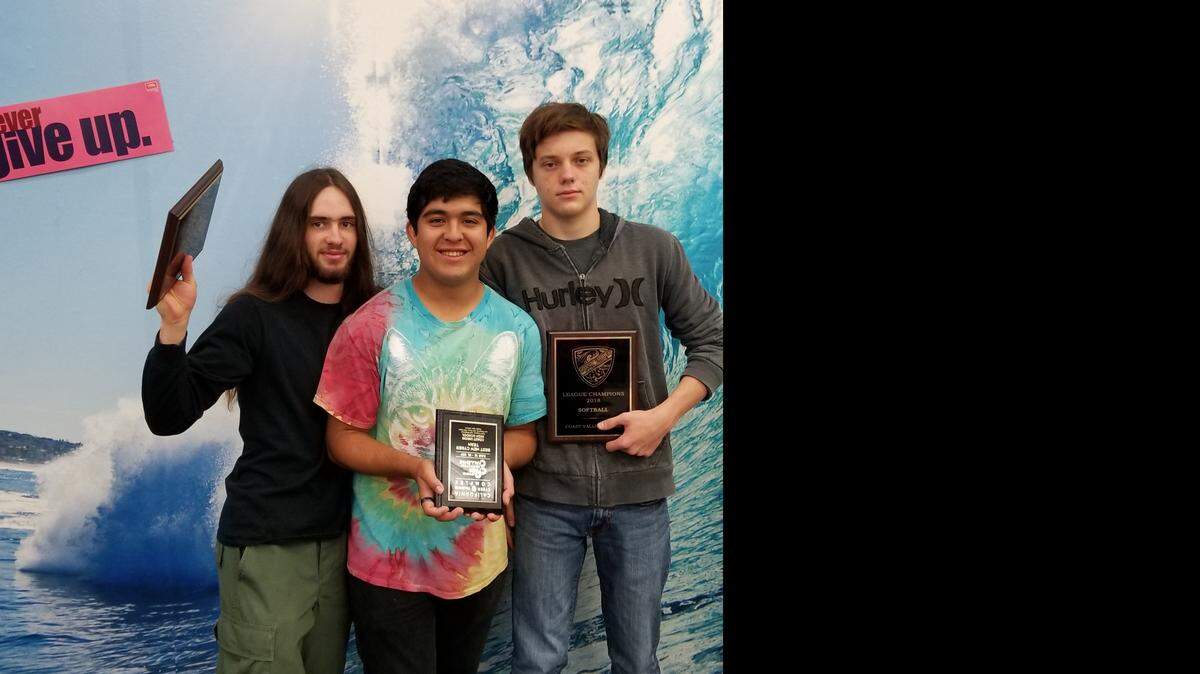Paul Butterfield (left) and Eric Hollinsead (right) received the No. 1 Doubles Award for the tennis team in 2018. Giovanni Espinoza was acknowledged by coach Shannon Sutherland as the team's MVP.