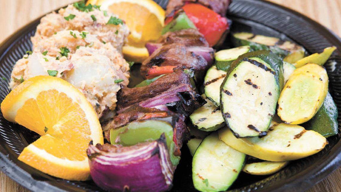 A beef kabob with chipotle potato salad and mixed veggies at The Rock Seafood & Grill in Nipomo.