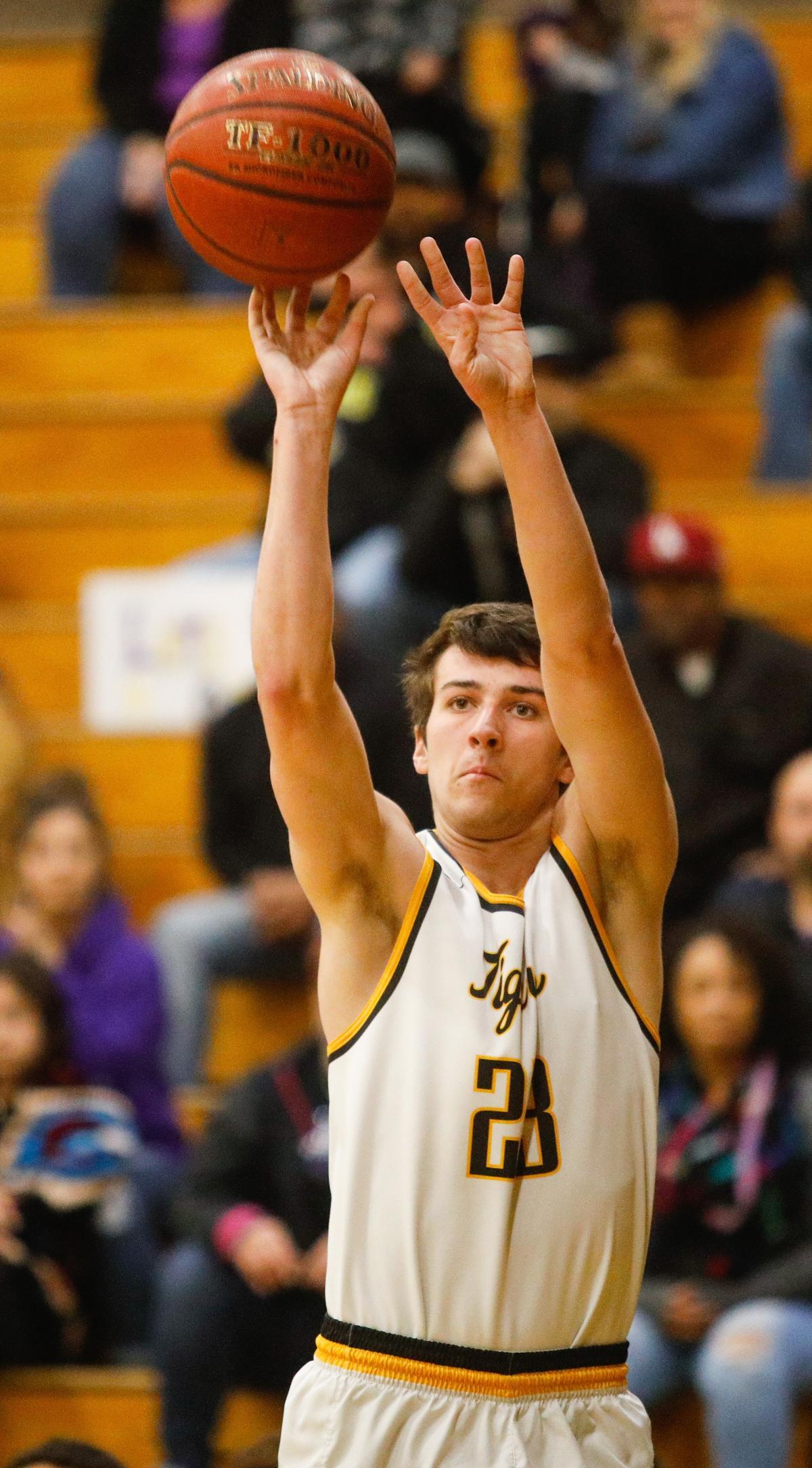 Addison Wright shoots. The San Luis Obispo HIgh School boys basketball team plays host to Lemoore in a semifinal game of the CIF-Central Section playoffs.