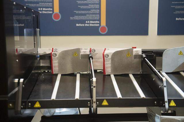The Agilis machine is the first step in the signature verification process for vote-by-mail ballots. The new system was installed at the county elections office on Feb. 2, 2026.