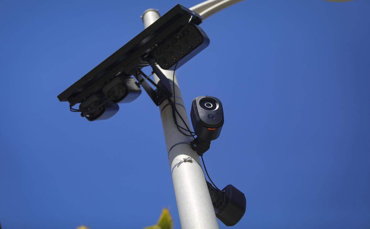 Two Flock cameras, under solar panel are attached to utility poleon California Blvd at Cal Poly as seen here on March 12, 2026.