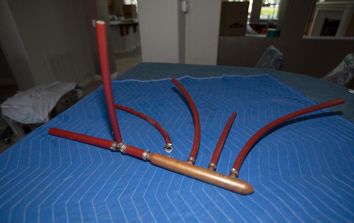 A failed water manifold in a bathroom ceiling flooded Don Smith’s Trilogy at Monarch Dunes home, requiring $200,000 and $300,000 of renovation work.