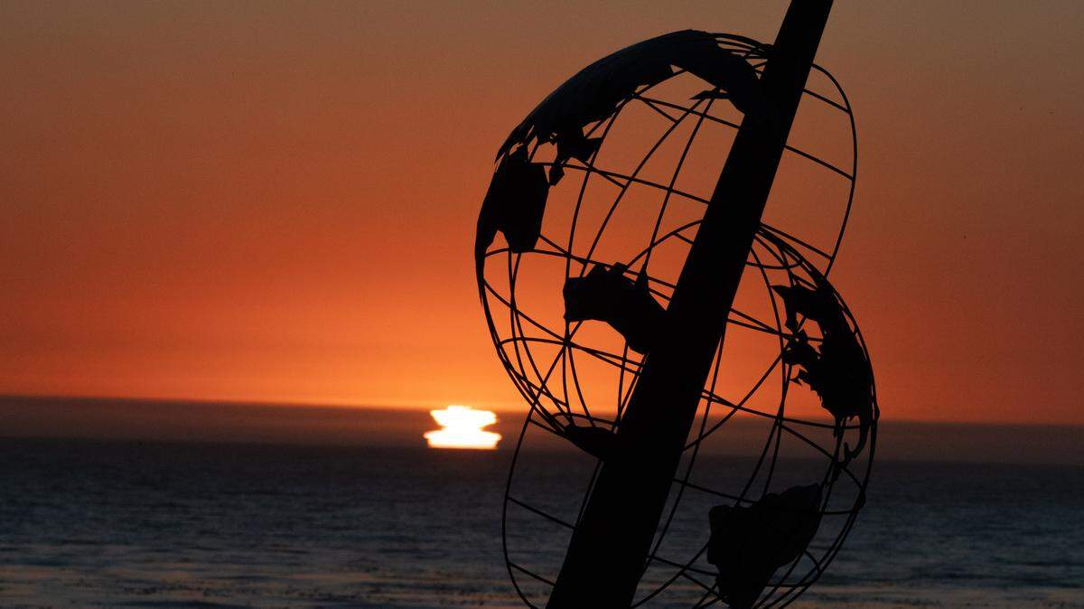 As the sun sets on Oct. 1, 2021, on the San Simeon shoreline, it highlights “Shift,” a 1,200-pound monument installed by a team of designers and creators who want to make people think about what they can do to help bring the earth and its inhabitants back into harmony and alignment.