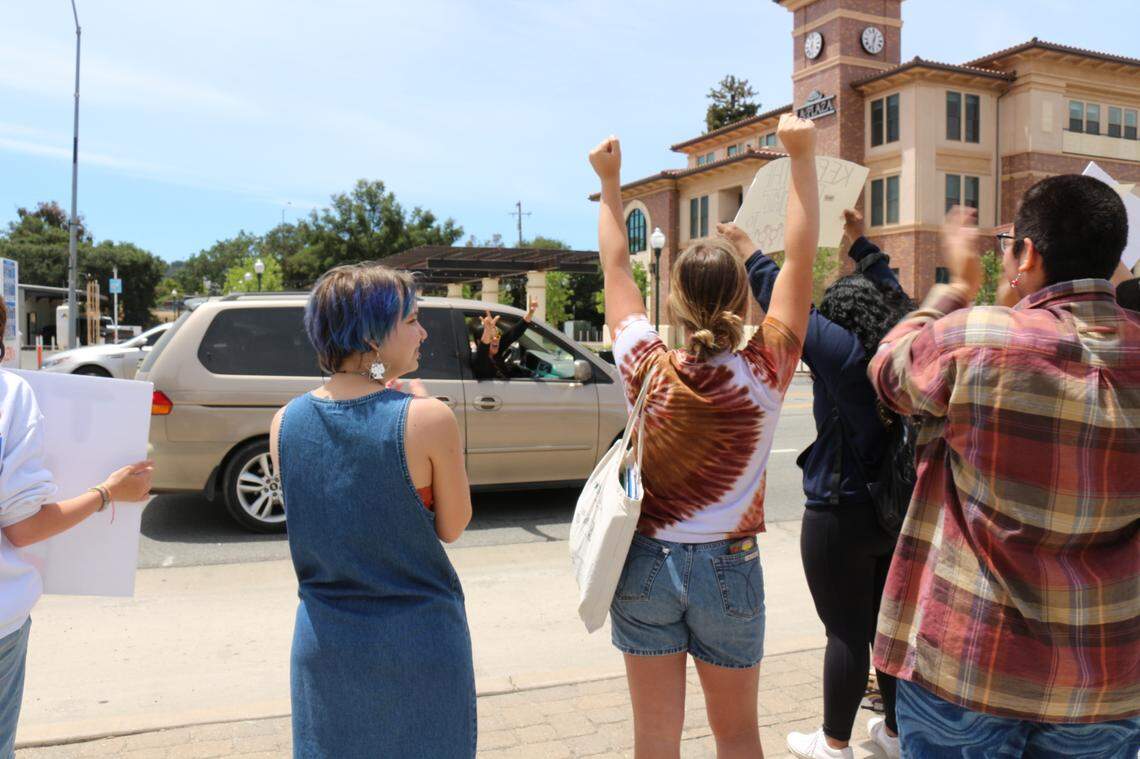 Atascadero High School students were cheered on by some driving by on El Camino Real as they rallied for reproductive and abortion rights after walking out of class on May 12, 2022.