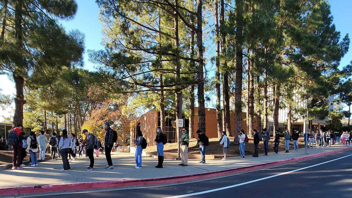 Cal Poly students wait in a long line for COVID-19 tests on Jan. 4, 2022. Students were required to get tested during the first week of the winter quarter.