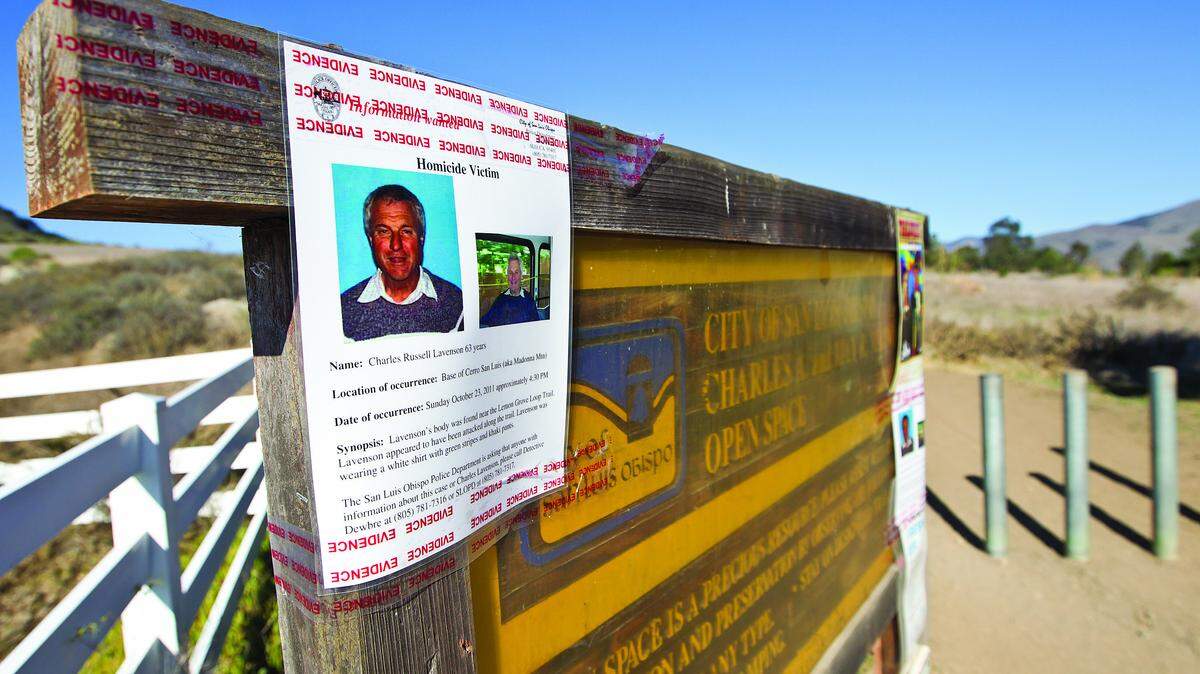 Detectives posted laminated fliers at the start of the Lemon Grove Loop Trail about Charles Lavenson’s death.