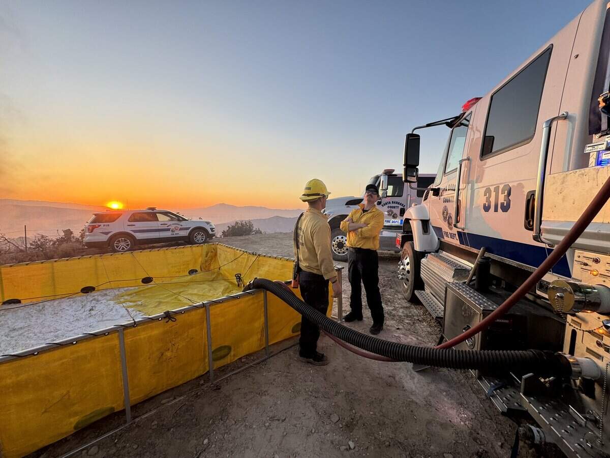 Firefighters respond to a wildfire southeast of New Cuyama and the intersection of Kirschenmenn Road and Foothill Road in Santa Barbara County on May 28, 2024. An evacuation warning was issued for nearby residents.