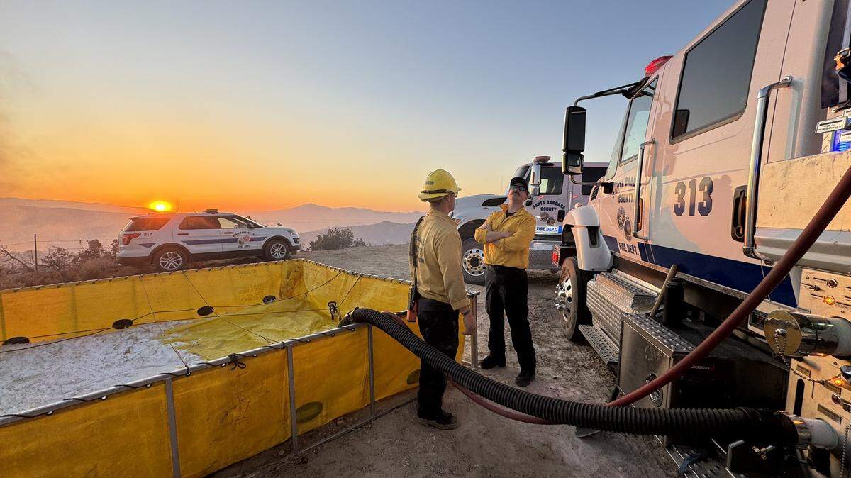Firefighters respond to a wildfire southeast of New Cuyama and the intersection of Kirschenmenn Road and Foothill Road in Santa Barbara County on May 28, 2024. An evacuation warning was issued for nearby residents.