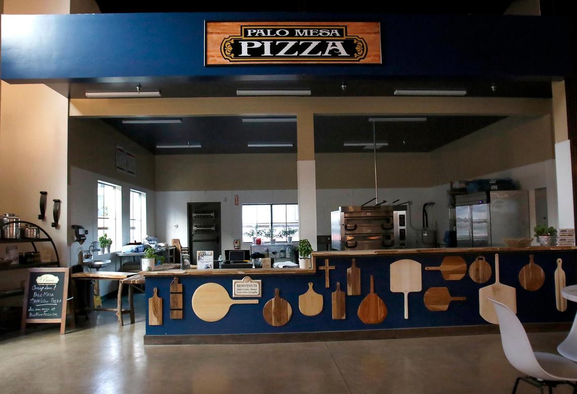 SLO Ranch Farms has six new business opening soon. Paso Mesa Pizza signs say “coming soon.”
