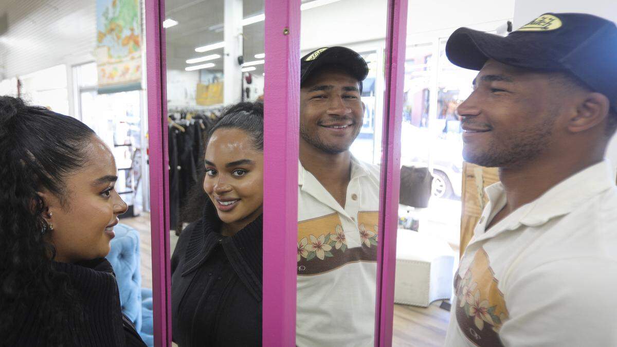 Thrifty Beaches co-owners Maria Trott and Adam Kemp find a new life for clothing and furnishings in their curated thrift store, seen on Sept. 16, 2025.