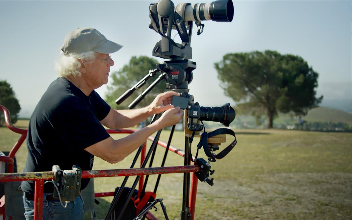 Brian Lawler sets up his cameras to take a panoramic photo of San Luis Obispo from atop Terrace Hill, recreating a historic image captured by Frank C. Aston in 1930.