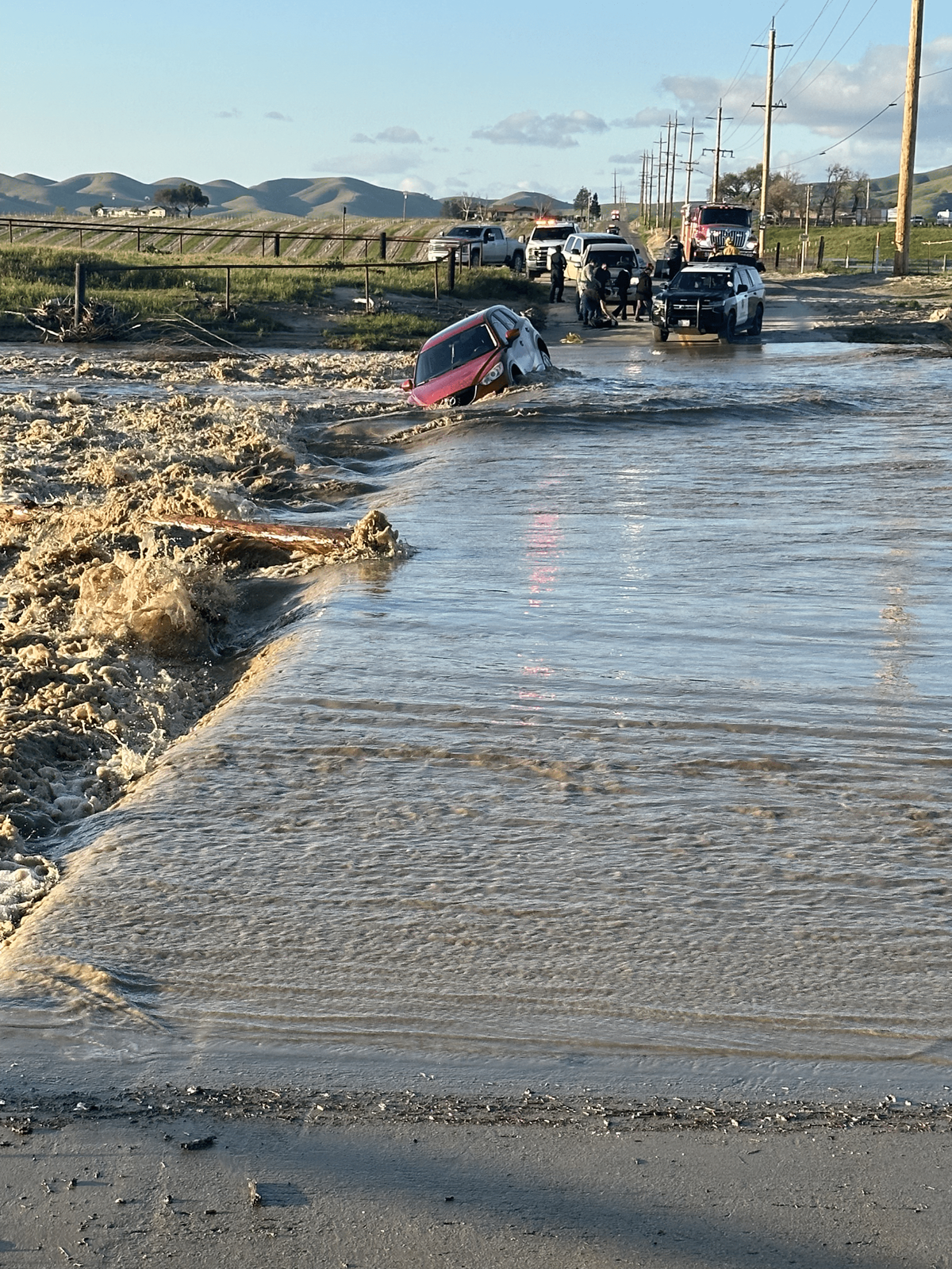A mother and her three children were rescued in rural Paso Robles on Thursday, March 23, 2023, after floodwaters swept their car off North River Road and into the Estrella River.