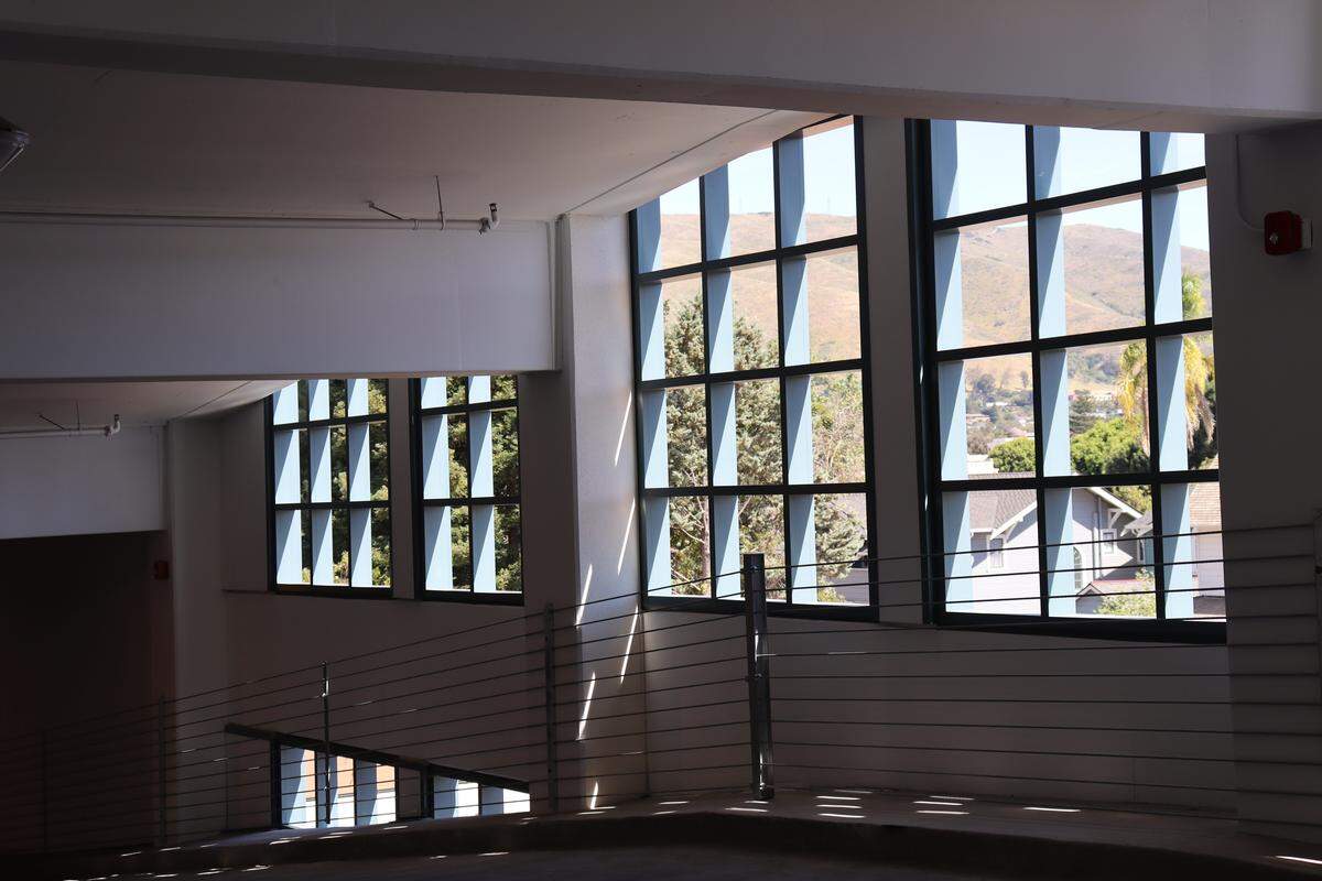 The new Cultural Arts District Parking Structure on Palm Street across from Mission Prep, seen here on March 23, 2026, opened on March 17 with new safety features including window covers to prevent falls.