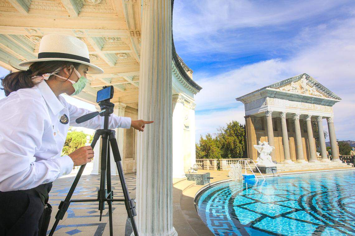 Tracy Kosinski a guide 1 at Hearst Castle gives a virtual art and architecture tour to third graders. She explains the Neptune pool and fields text questions from the class. Guides are conducting virtual tours of the castle for school groups and other organizations.