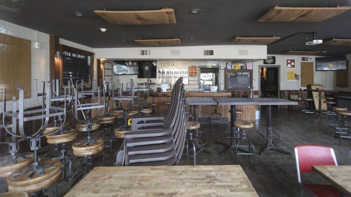 The Tent City Beer Co. had chairs stacked and oak leaves piling up outside in Atascadero on Dec. 30, 2025.