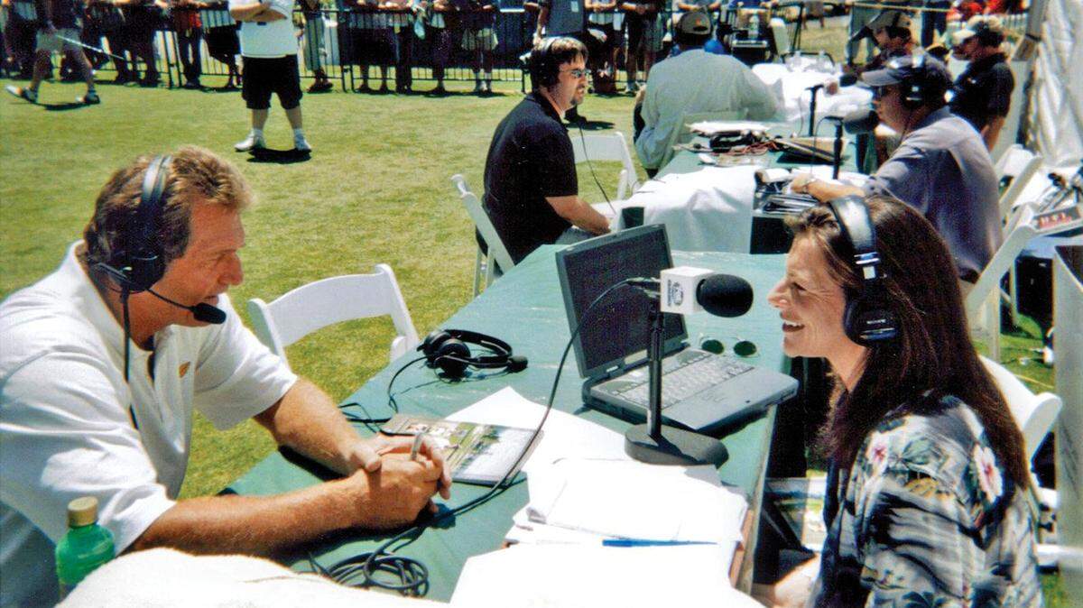 C.J. Silas interviews former NFL quarterback Joe Theisman at the American Century Celebrity Golf Tournament in South Lake Tahoe in 2004.