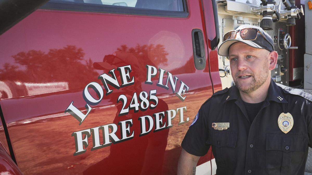 Lone Pine Fire Department Capt. Ash Seiter said coming off of a 24-hour shift on the line to a hot meal, showers and a place to sleep helps firefighters get through a long deployment far from home. A fire camp was being assembled at Santa Margarita Ranch, seen here on Aug. 7, 2025.