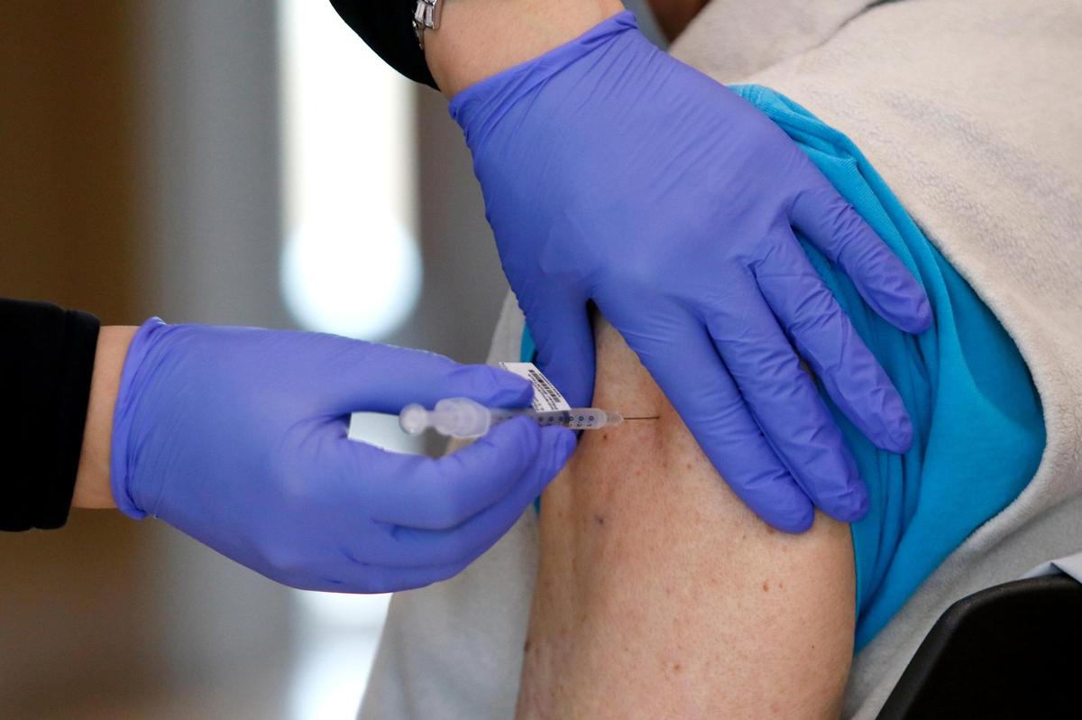 Bob Thomas of San Luis Obispo receives a COVID-19 vaccination at French Hospital Medical Center in February 2021.