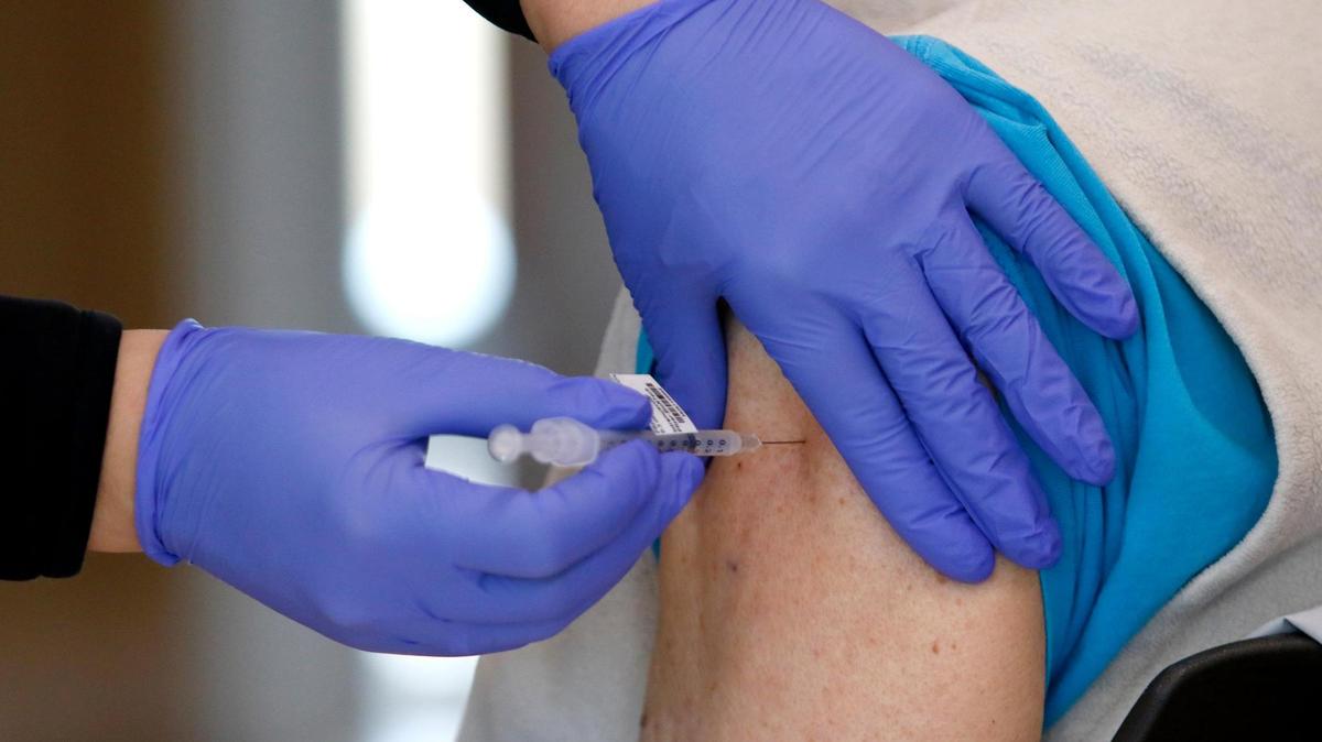 Bob Thomas of San Luis Obispo receives the COVID-19 vaccination at French Hospital Medical Center.