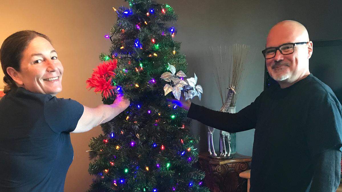 Granddaughter Tina Tanner and grandson-in-love Jesse Valdez help columnist Kathe Tanner ease toward Christmas, her first full holiday season after the death of her husband Richard last December. Working side-by-side with the couple on the Christmas tree turned what would have painful to do alone into hilarious adventure.