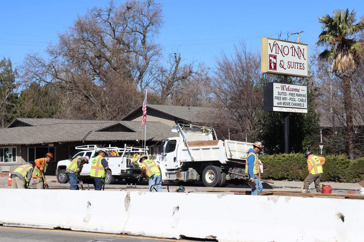 Construction workers on El Camino Real in Atascadero build a center road median for the main drag of downtown as a part of the city’s safety and parking enhancement project starting in June 2024 and lasting to summer 2025.