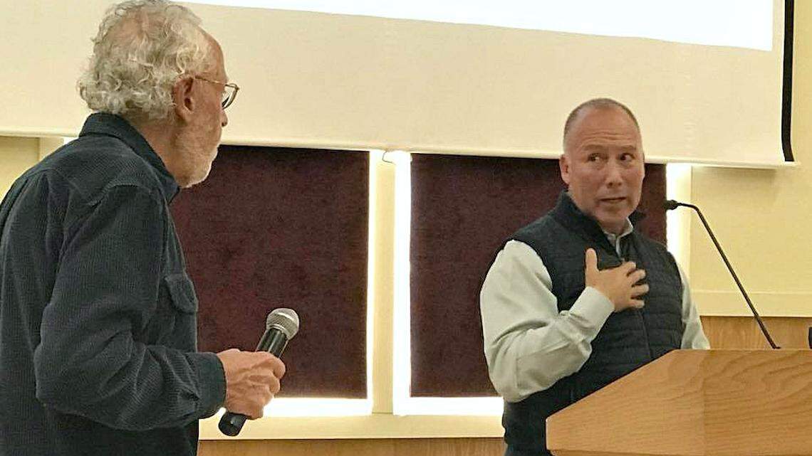 CCSD Director Harry Farmer, left, poses a question to consultant Dean Florez during a town hall meeting Farmer moderated Wednesday, April 11, at the Cambria Veterans Memorial Building.