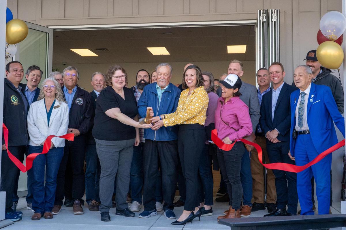 Leaders of the the Paso Robles Housing Authority, Affordable Housing Development Corporation and Paso Robles city government cut the ribbon at the grand opening of Sunrise Villas, a 69-unit affordable housing project within the Viñedo development, Tuesday, March 18, 2025.