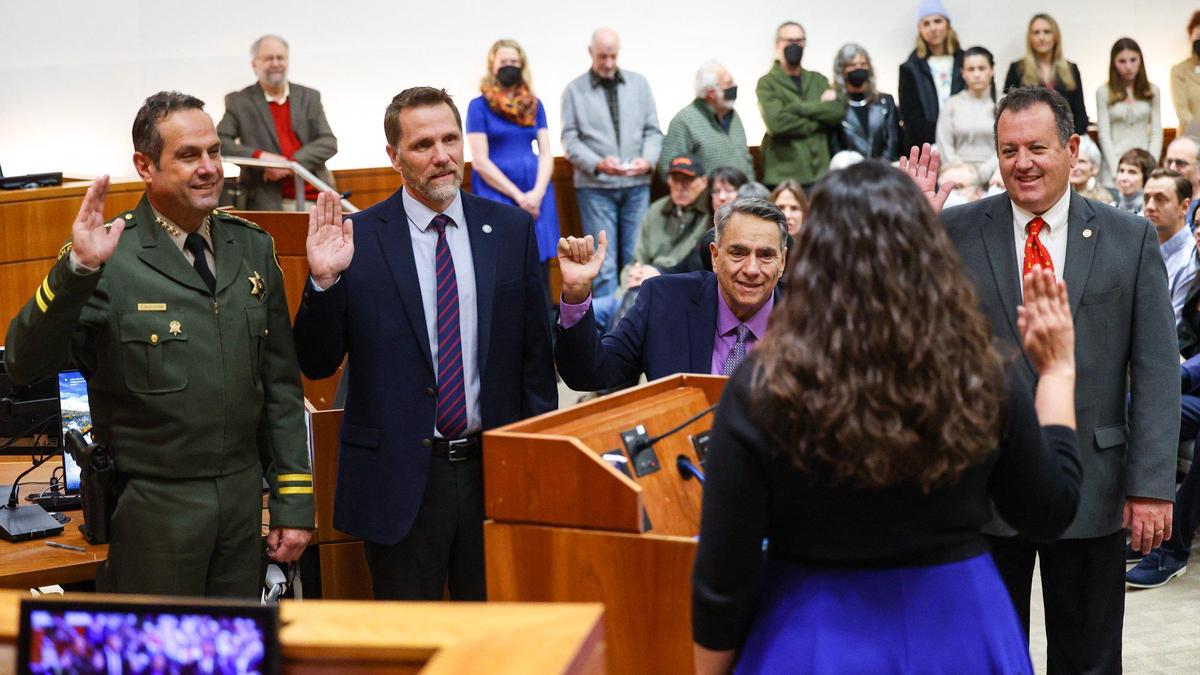 From left, Sheriff Ian Parkinson, Auditor-Controller-Treasurer-Tax Collector James Hamilton, County Assessor Tom J. Bordonaro Jr., and County Superintendent of Schools James J. Brescia are sworn into office on Tuesday, Jan. 3, 2023, at the Board of Supervisors chambers. Administering the oath is County Clerk-Recorder Elaina Cano.