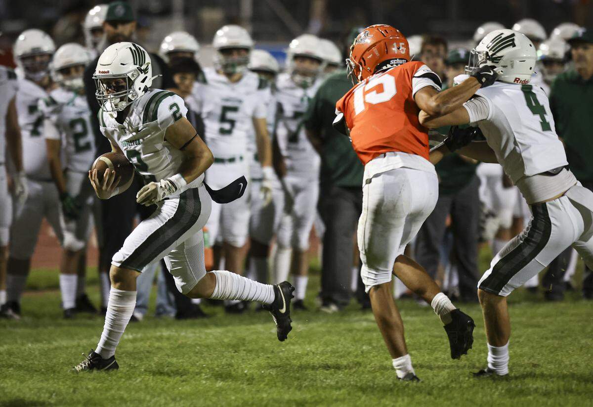 Luke Olsen runs for the Eagles. The Templeton High School football team beat Atascadero 31-20 on Sept. 26, 2025.