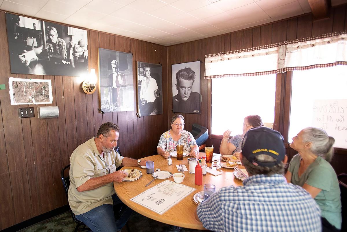 James Dean memorabilia decorates the wood-paneled walls of the Jack Ranch Cafe in Cholame. The restaurant is closing on Aug. 28, 2022. The Hollywood legend died in a car crash at the Cholame “Y” in 1955.